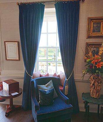 Victoria Gayle Interiors upholstered bespoke curtains and upholstered blue chair
